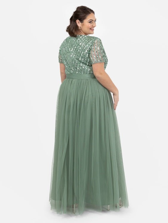 Back view of plus size green embellished maxi dress with flowing tulle skirt - Curvy Chic Boutique