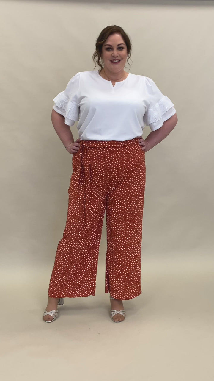 Pantaloni a gamba larga a pois blu scuro o ruggine